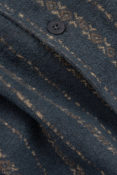 Close-up of a textured fabric with a subtle pattern