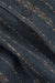 Close-up of a textured fabric with a subtle pattern