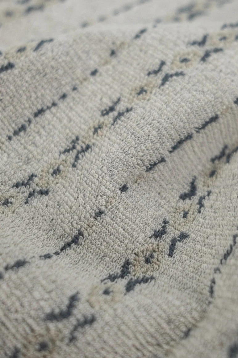 Close-up of a textured fabric with a subtle pattern
