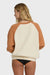 Back of a woman wearing a brown and beige sweatshirt on a white background