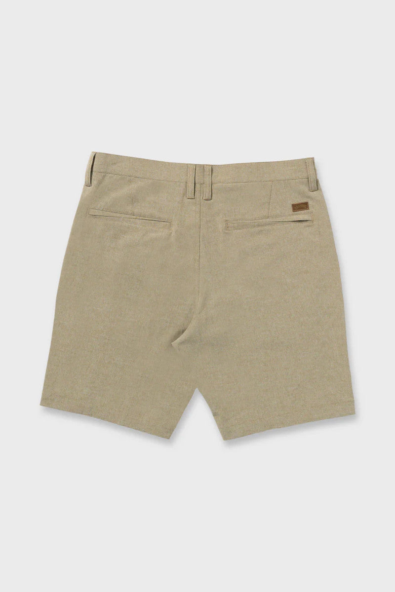 Beige shorts on a light gray background