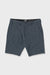 Navy shorts with brand logo on a light gray background