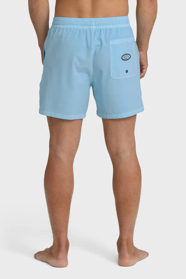 Back view of a man wearing light blue swim shorts with an elastic waist and back pocket with branding patch on a white background