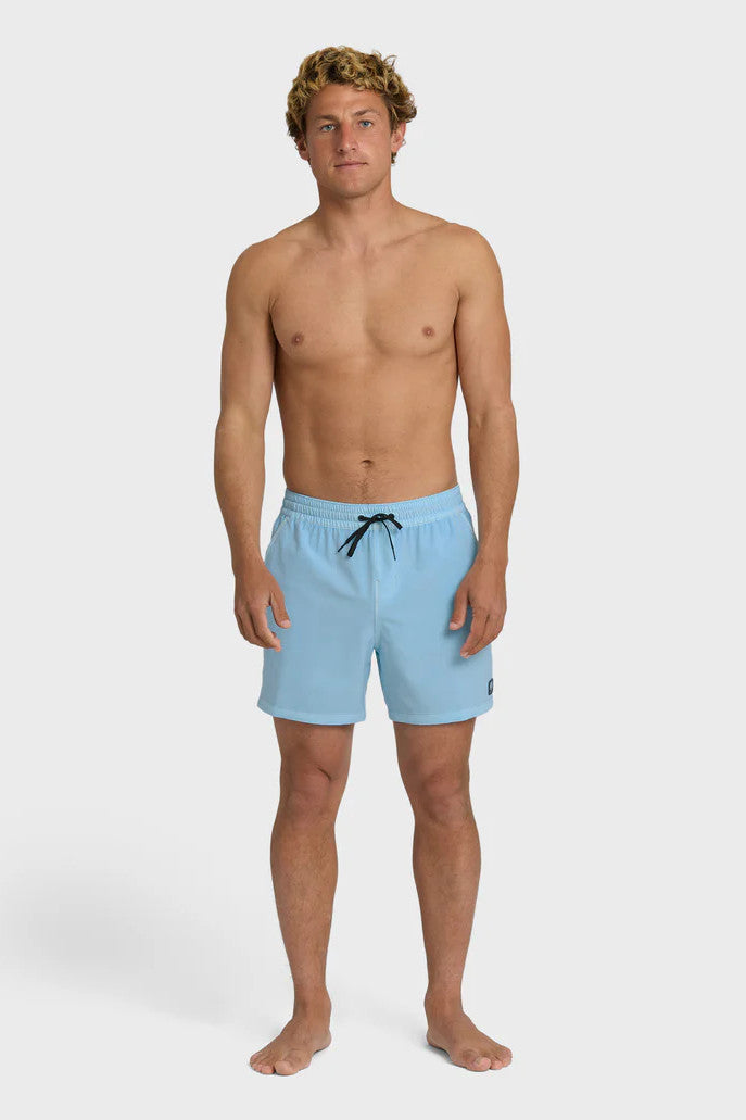Man wearing light blue swim shorts with an elastic waist and drawstring on a white background