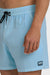 Man wearing light blue swim shorts with an elastic waist and drawstring on a white background