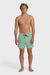Man wearing light green swim shorts with an elastic waist and drawstring on a white background
