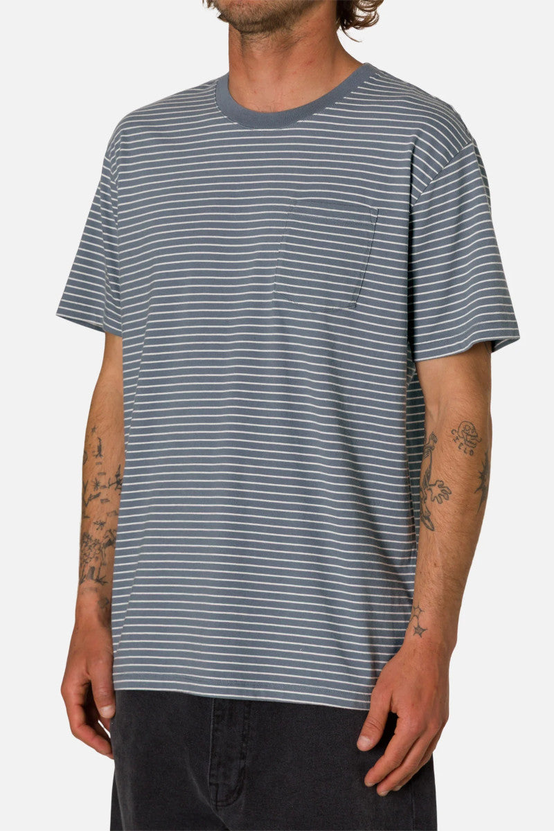 Man wearing a blue and white striped t-shirt on a white background