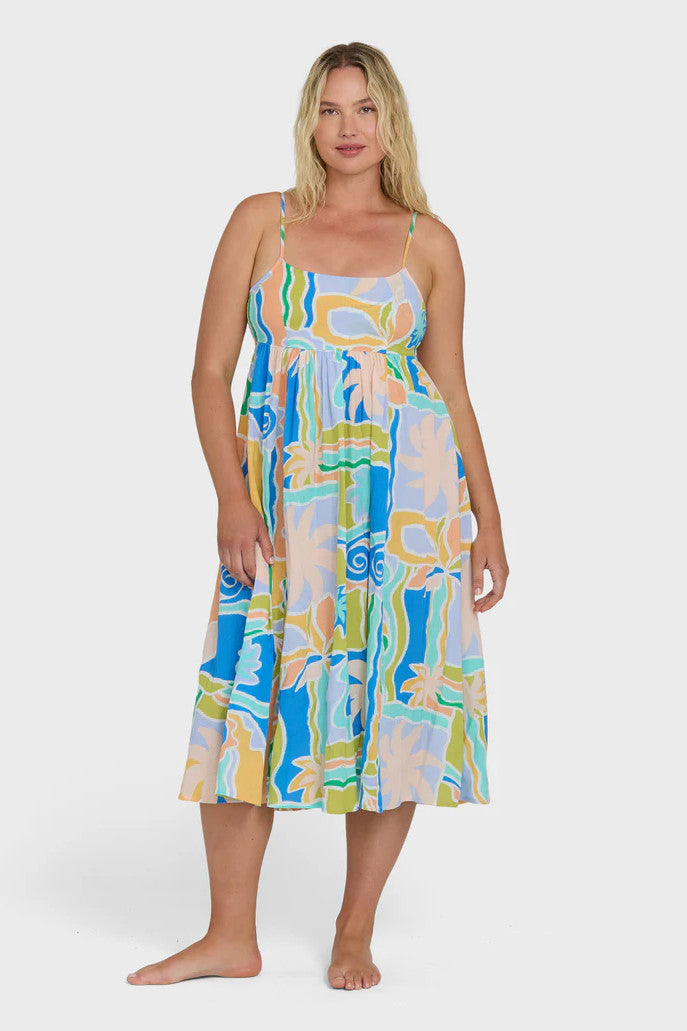 Woman wearing a colorful dress with a white background