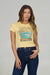 Woman wearing a yellow t-shirt with a beach graphic that says "Salty Crew" and "Find Refuge in the Sea"