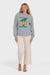 Woman wearing a gray sweatshirt with a palm tree design and 'Billabong Since 1973' text on a white background