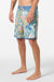 Person wearing colorful floral-patterned shorts on a white background