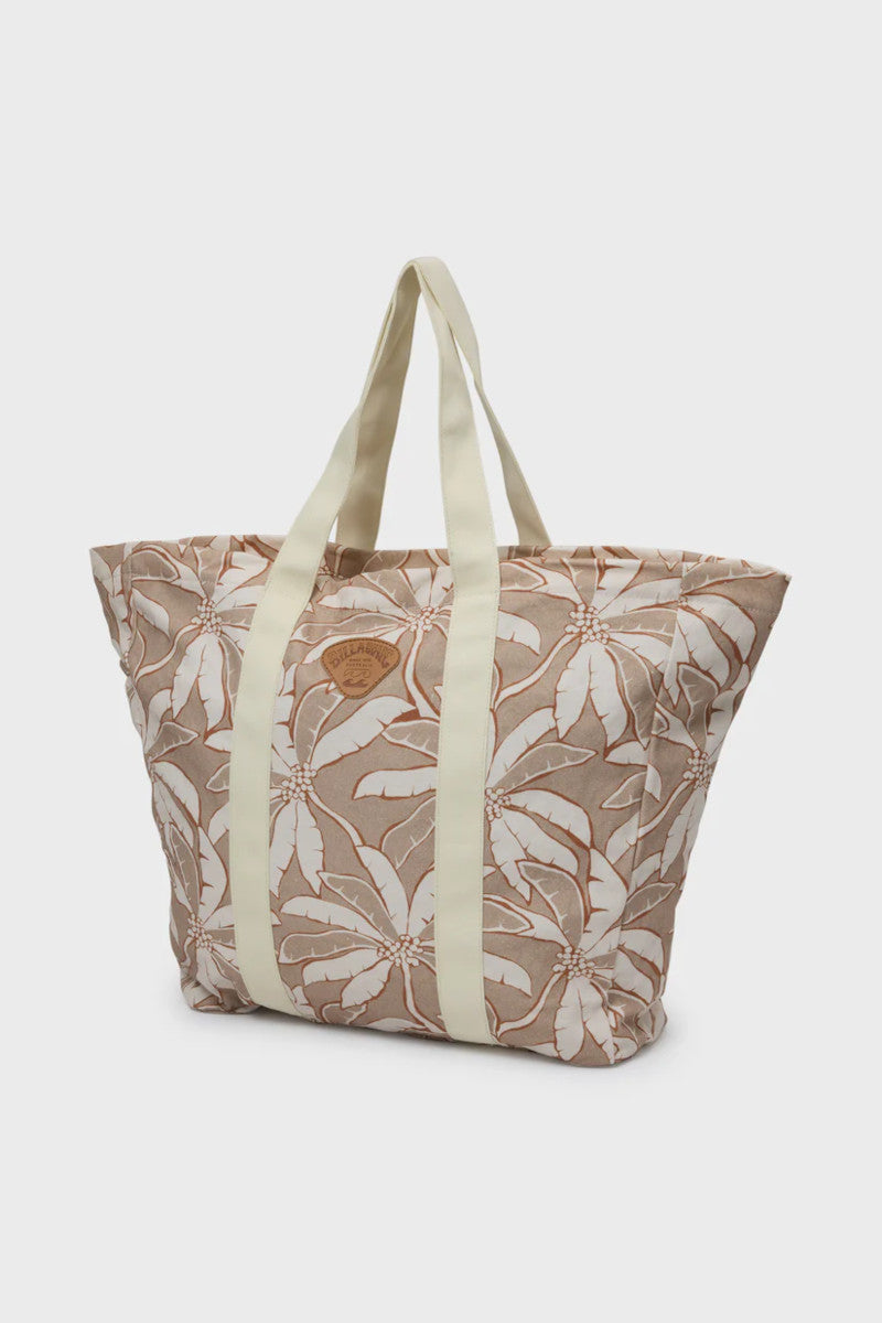 Beige tote bag with leaf pattern on a white background