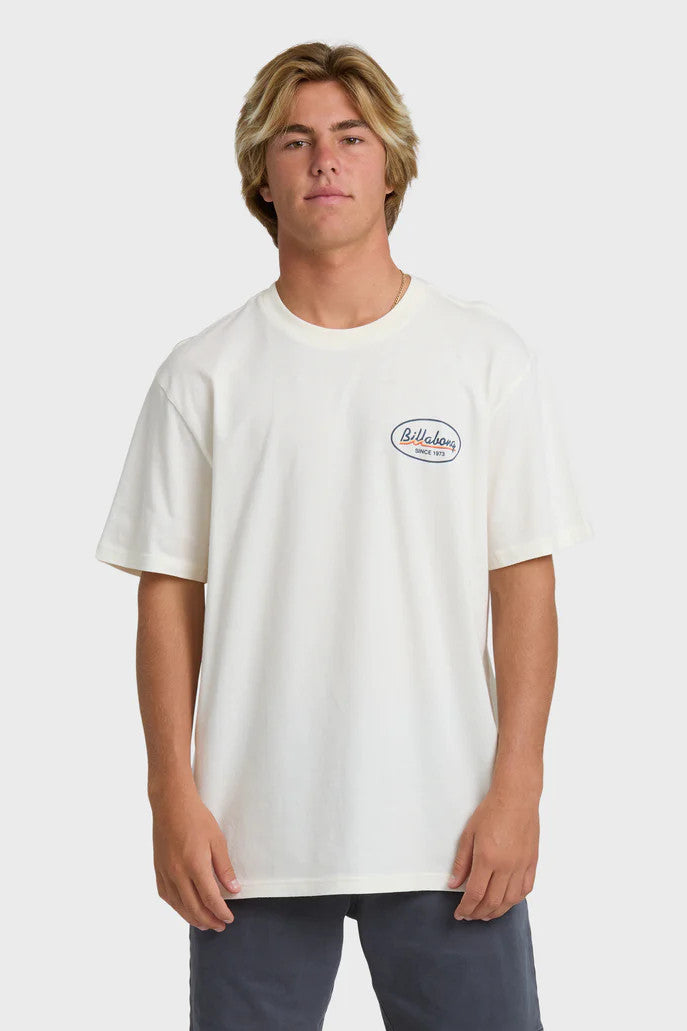Person wearing a white t-shirt with a logo on a plain background