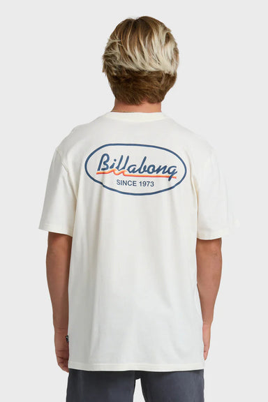 Person wearing a white t-shirt with Billabong logo on a white background