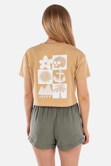 Person wearing a beige t-shirt with white graphics and 'JETTY' branding, standing against a white background.