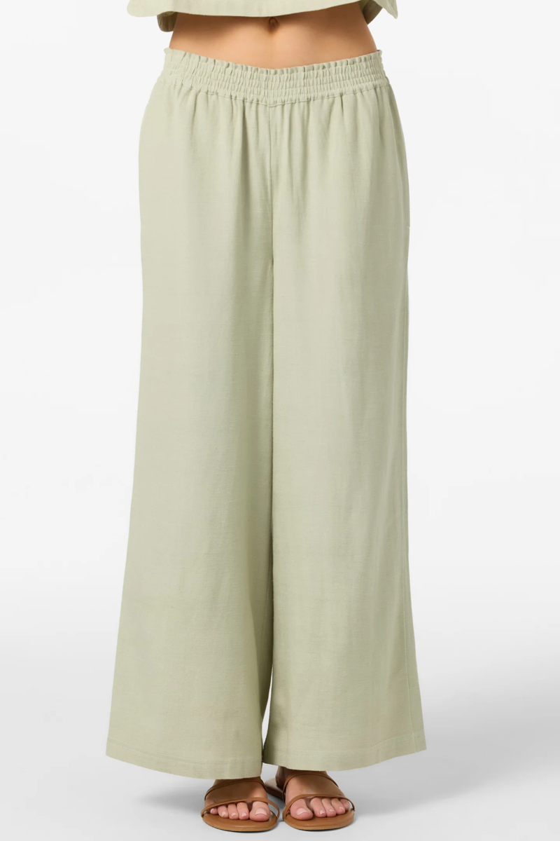 Light green wide-leg pants on a white background