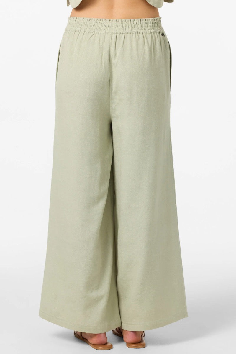 Light green wide-leg pants on a white background