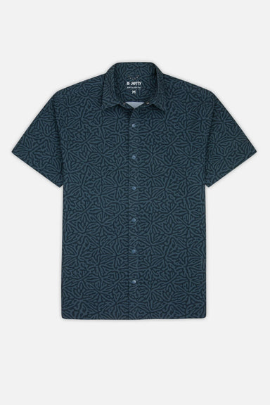 Short-sleeve shirt with geometric pattern on a white background