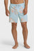 Man wearing light blue swim trunks with a yellow and orange oversized floral pattern and elastic waistband with drawstring on a white background