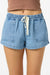 Blue denim shorts with a drawstring on a white background
