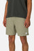 Person wearing olive green shorts and a dark shirt on a white background