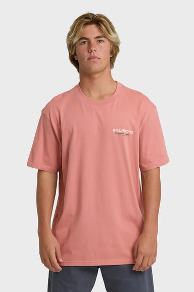 Person wearing a pink t-shirt with a logo on a white background