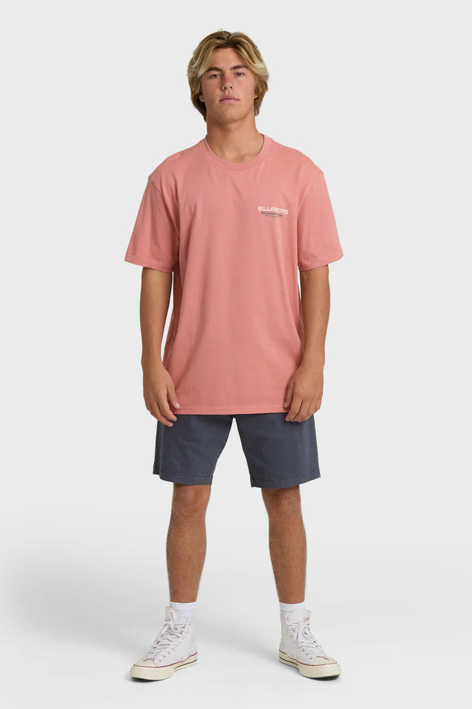 Person wearing a pink t-shirt and blue shorts on a white background