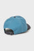 Back of a blue cap on a light gray background