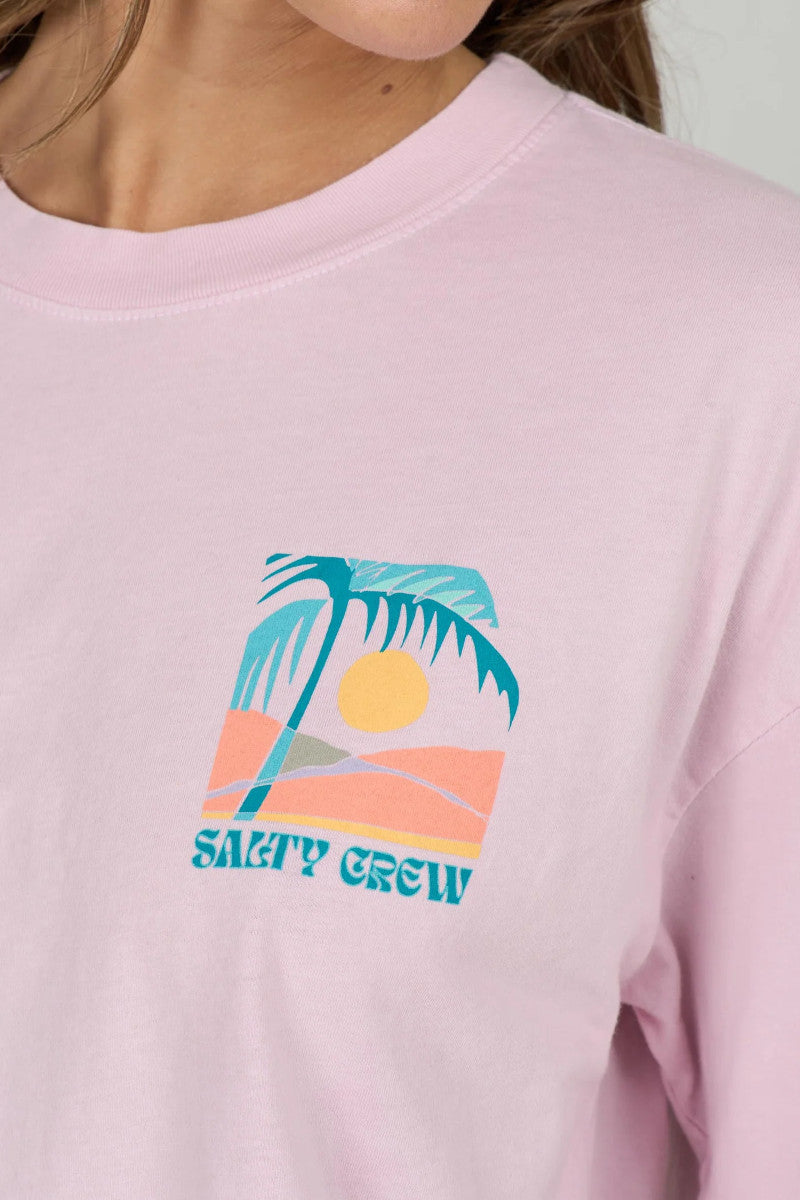 Pink t-shirt with a palm tree and sunset graphic and 'Salty Crew' text.